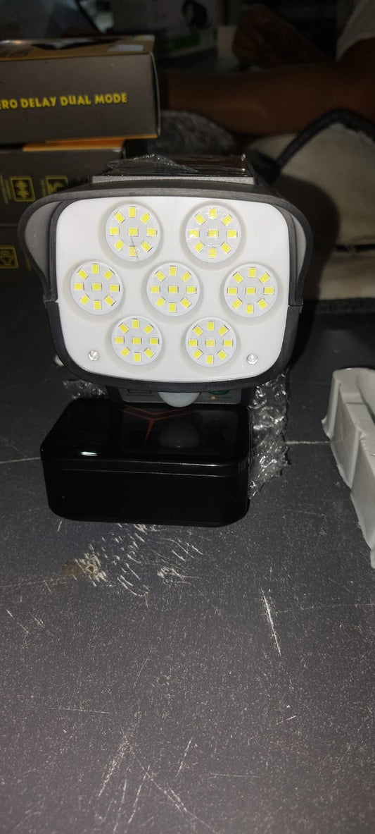 • Solar-powered camera-shaped floodlight